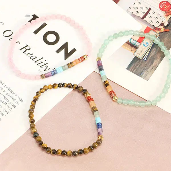 Bracelet 7 chakras perles rondes et cylindriques - 3 pierres kaosix