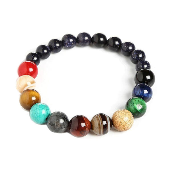 Bracelet Système Solaire avec 11 Planètes en Perles de Pierres sur fond blanc Kaosix