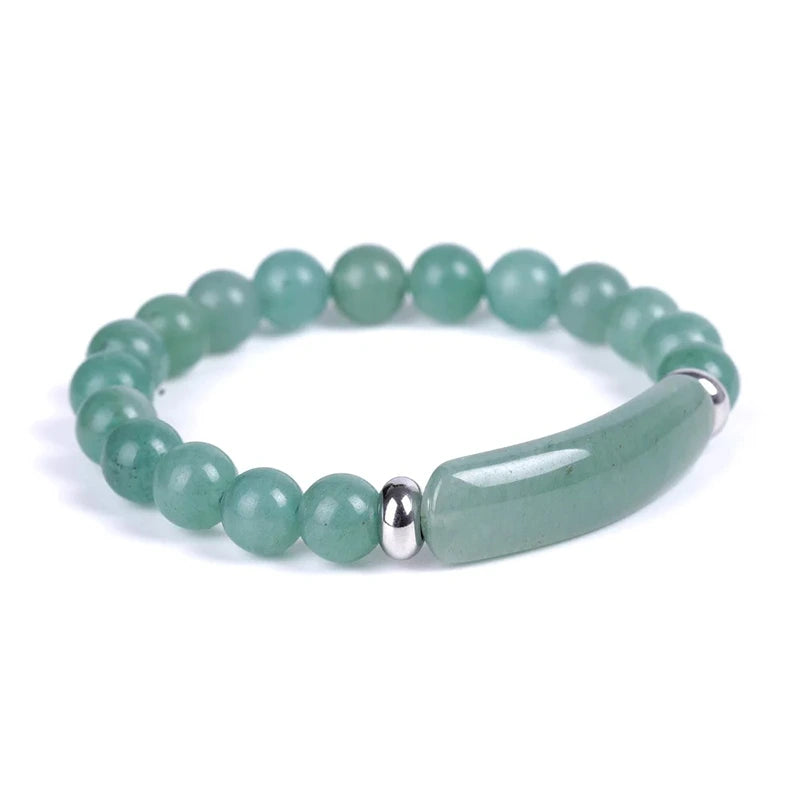 Bracelet en Aventurine Bande Courbe et Perles sur un sol blanc kaosix