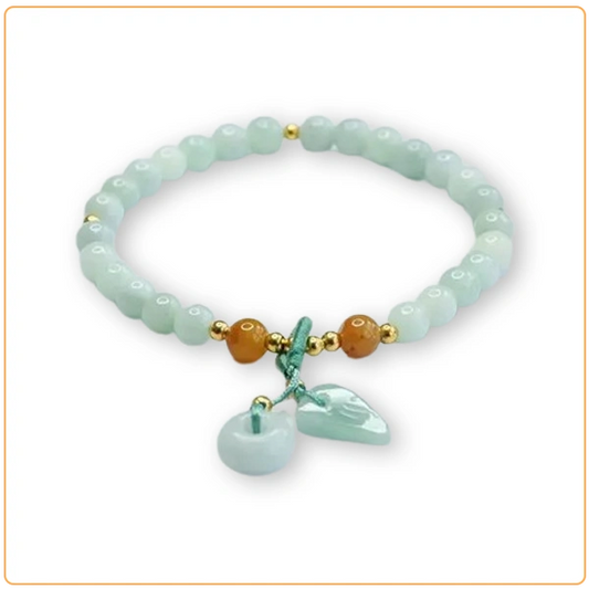 Bracelet en quartz fraise et quartz vert sur fond blanc avec cadre orange Kaosix