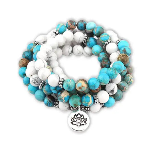 Mala 108 perles Howlite Turquoise Lotus sur fond blanc kaosix