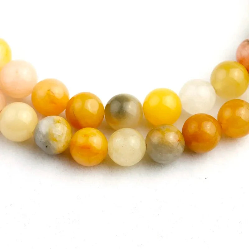 Mala 108 perles en Aventurine Jaune avec gros plan sur les perles kaosix