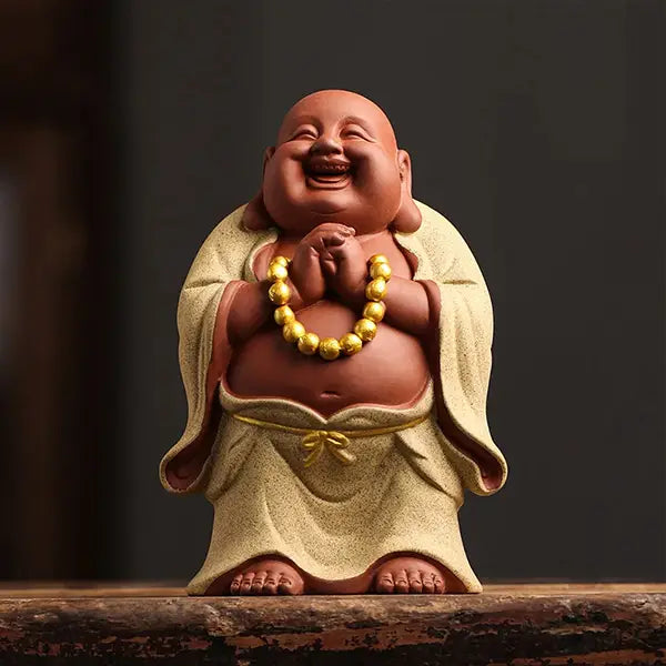Petit Bouddha rieur jaune sur planche kaosix