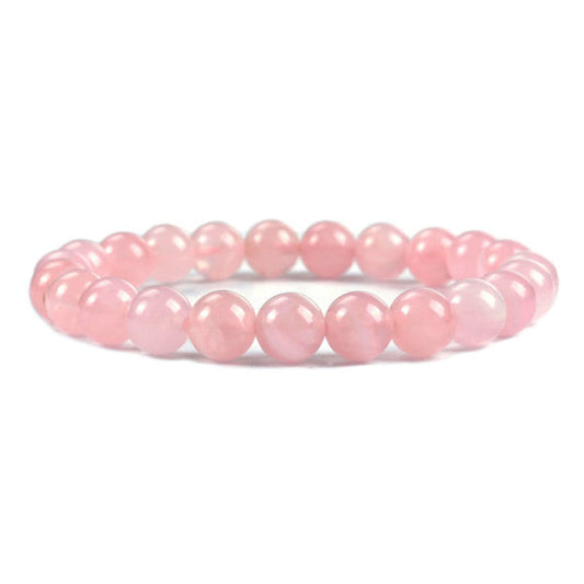Bracelet en quartz rose amour boule 8mm sur fond blanc avec cadre orange Kaosix