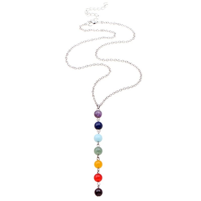 Pendentif collier 7 chakras “équilibre” sur fond blanc avec sa chaine Kaosix