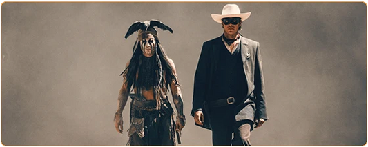 Un cowboy et un indien qui marchent face caméra