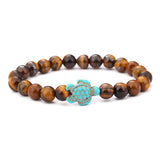 Bracelet Perles d’œil de Tigre Tortue Marine sur fond blanc Kaosix