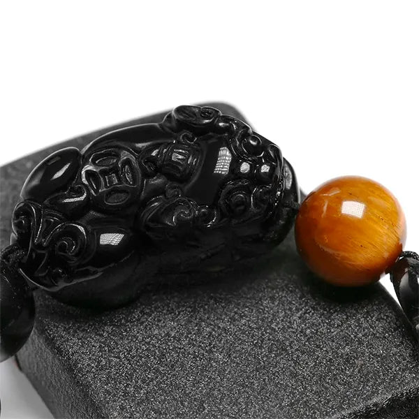 Bracelet Pi Xiu (Pi Yao) Obsidienne Œil de Tigre gros plan sur Pi Xiu kaosix