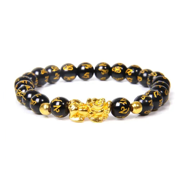 Bracelet Pi Xiu en obsidienne noire Mani Mantra sur fond blanc avec cadre orange kaosix