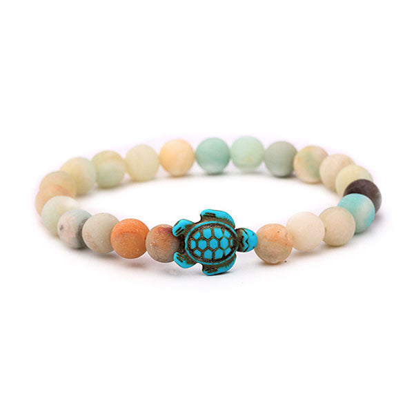 Bracelet Pierre d’Amazonite Tortue Marine sur fond blanc Kaosix