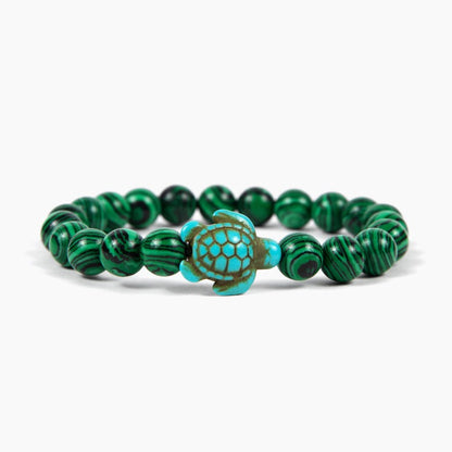 Bracelet Pierre de Malachite Tortue Marine sur un sol blanc Kaosix