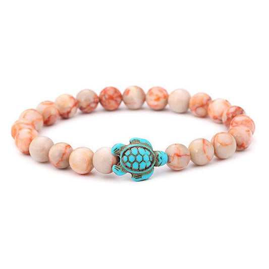 Bracelet Pierre de soleil Tortue Marine sur fond blanc Kaosix