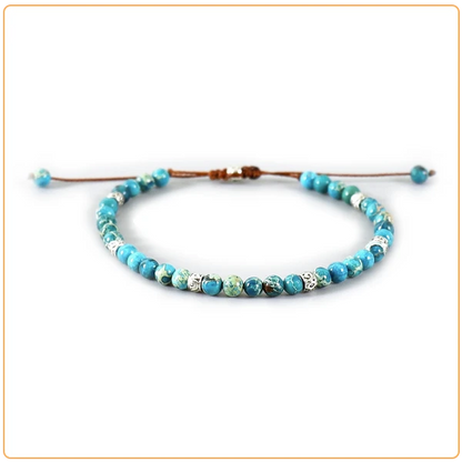 Bracelet Tibétain Bleu Turquoise sur fond blanc kaosix