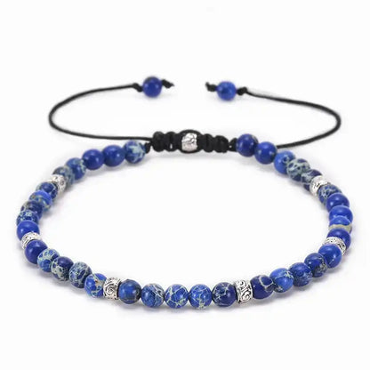 Bracelet Tibétain Jaspe Bleu sur un sol blanc kaosix