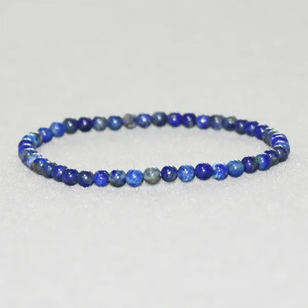 Bracelet en Lapis Lazuli Harmonie (boule 4 mm) sur fond gris kaosix