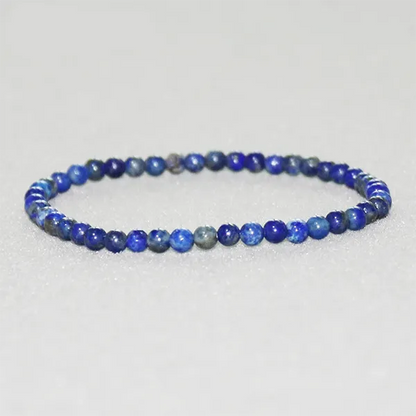 Bracelet en Lapis Lazuli Harmonie (boule 4 mm) sur fond gris kaosix