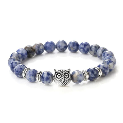 Bracelet en pierres avec hibou sodalite fond blanc kaosix