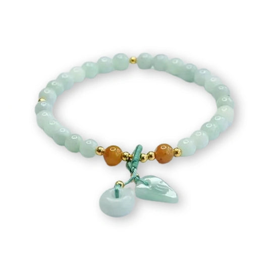 Bracelet en quartz fraise et quartz vert sur fond blanc avec cadre orange Kaosix