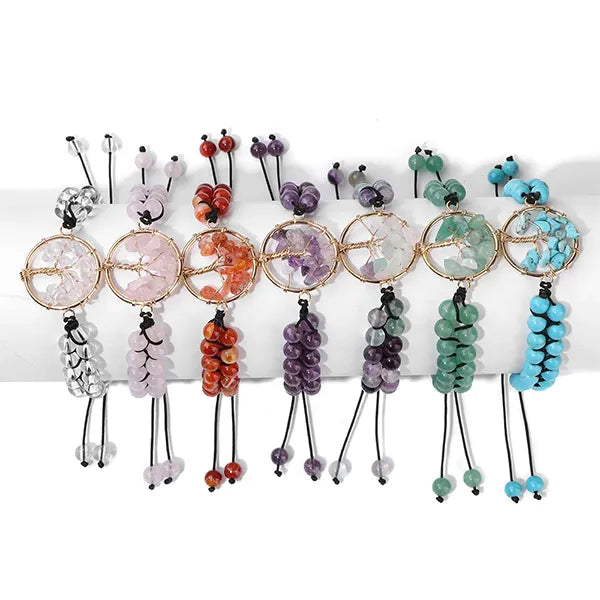Bracelets Arbre de Vie en Pierres Fines Énergie six pierres sur un socle cylindrique fond blanc kaosix