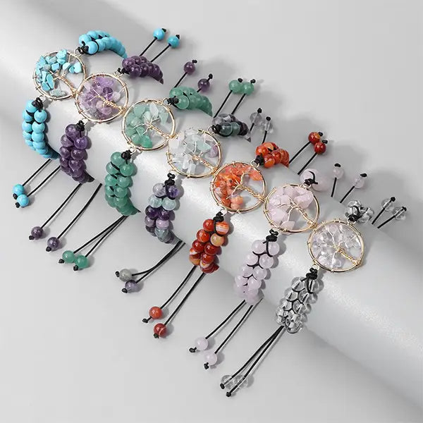 Bracelets Arbre de Vie en Pierres Fines Énergie six pierres sur un socle cylindrique fond gris kaosix
