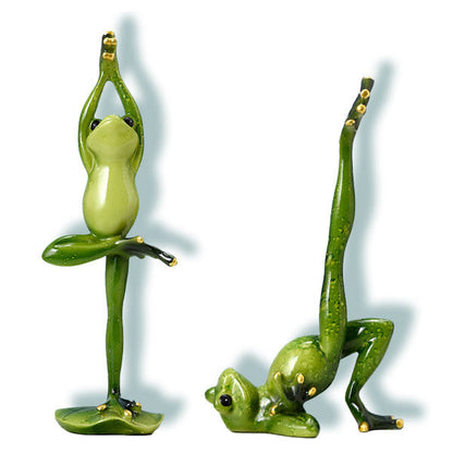 Deux statuettes Grenouille Yoga sur fond blanc Kaosix