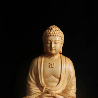 Statue Bouddha Assis Shakyamuni en Méditation gros plan sur le haut du corps avec un fond noir kaosix