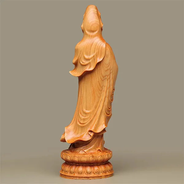 Statue Guanyin en bois de Cyprès Déesse de la Miséricorde sur fond gris vue de dos Kaosix