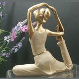 Statuettes de femmes en postures de yoga pigeon royal vue de dos Kaosix