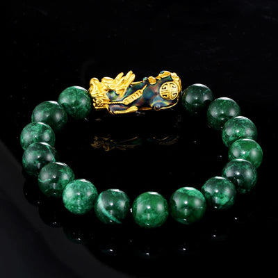 Bracelet Jade Pi Xiu Abondance sur un sol noir et un fond noir Kaosix