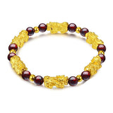 Bracelet Pi Xiu Grenat Rouge sur fond blanc avec cadre orange Kaosix