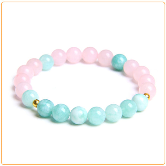 Bracelet “confiance” en quartz rose et amazonite sur fond blanc avec cadre orange Kaosix