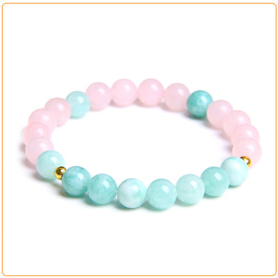 Bracelet “confiance” en quartz rose et amazonite sur fond blanc avec cadre orange Kaosix