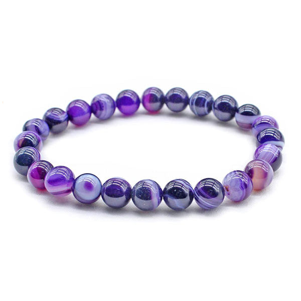 Bracelet apaisement en améthyste et agate violette sur fond blanc avec cadre orange kaosix