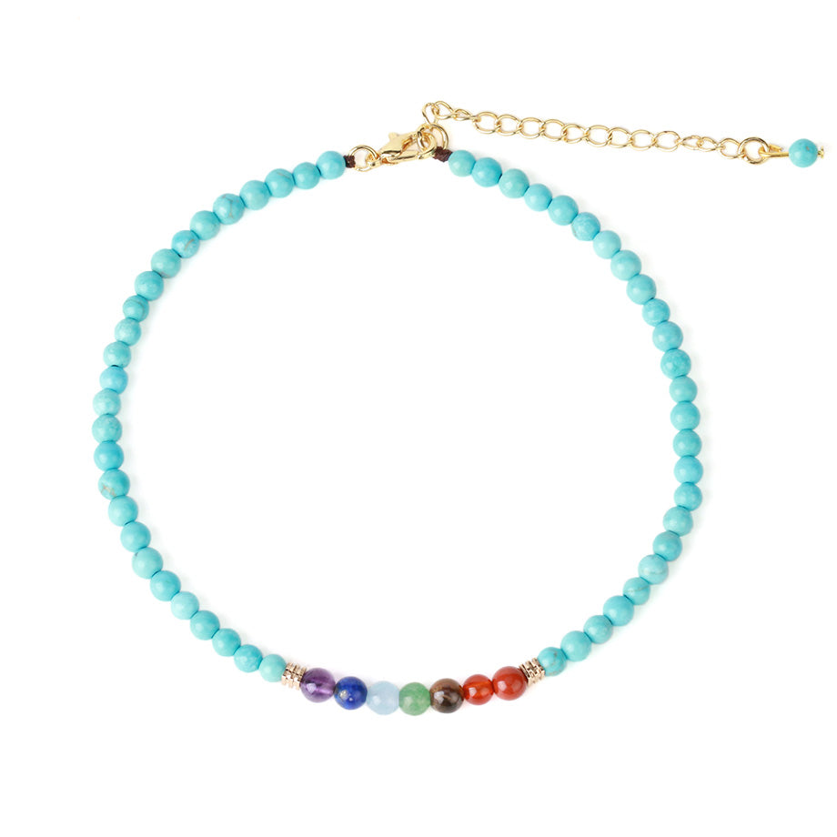 Bracelet de cheville 7 chakras et turquoise sur fond blanc Kaosix