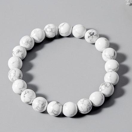 Bracelet en howlite calme boule 8 mm sur fond gris Kaosix