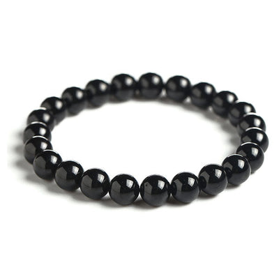 Bracelet en tourmaline noire ancrage boule 8 mm sur fond blanc avec cadre orange Kaosix