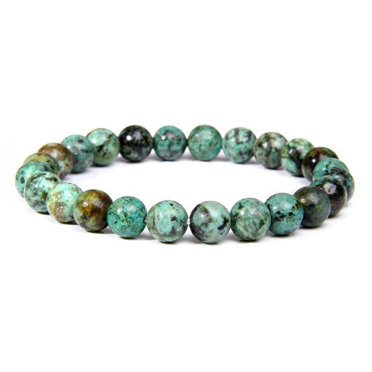 Bracelet en turquoise africaine évolution boule 8 mm sur fond blanc avec cadre orange Kaosix