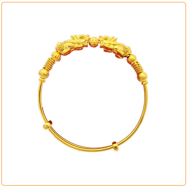 Bracelet jonc doré double Pi Xiu sur fond blanc avec cadre orange Kaosix
