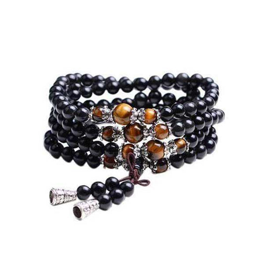 Bracelet mala 108 perles onyx noir œil de tigre sur fond blanc avec cadre orange Kaosix