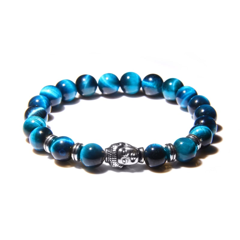 Bracelet œil de tigre bleu tête de Bouddha sur fond blanc avec ombre Kaosix