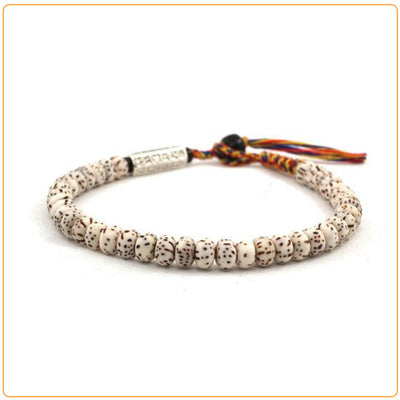 Bracelet tibétain graine de bodhi mantra sur fond blanc avec cadre orange Kaosix