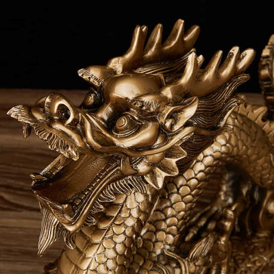 Gros plan tete de Statue Dragon Chinois bronze Perle Feng Shui Kaosix
