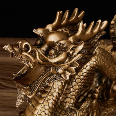 Gros plan tete de Statue Dragon Chinois bronze Perle Feng Shui Kaosix
