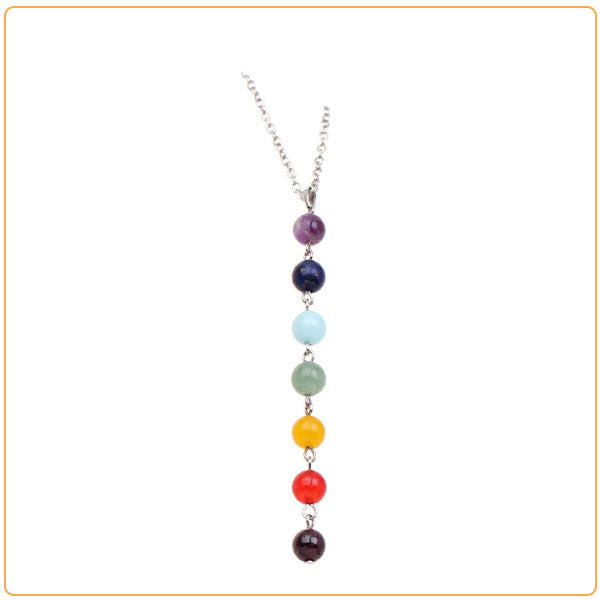Pendentif collier 7 chakras “équilibre” sur fond blanc avec cadre orange Kaoisx