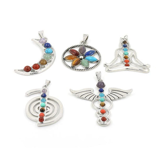 Pendentifs 7 chakras symbole sur fond blanc avec cadre orange Kaosix