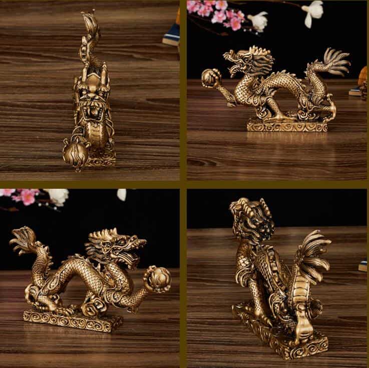 Statue Dragon Chinois bronze Perle Feng Shui dans 4 poses différentes sur table en bois Kaosix