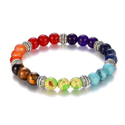 Véritable bracelet 7 chakras sur fond blanc avec cadre orange Kaosix