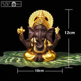 Statue de Ganesh doré posé sur feuille de bananier avec dimensions